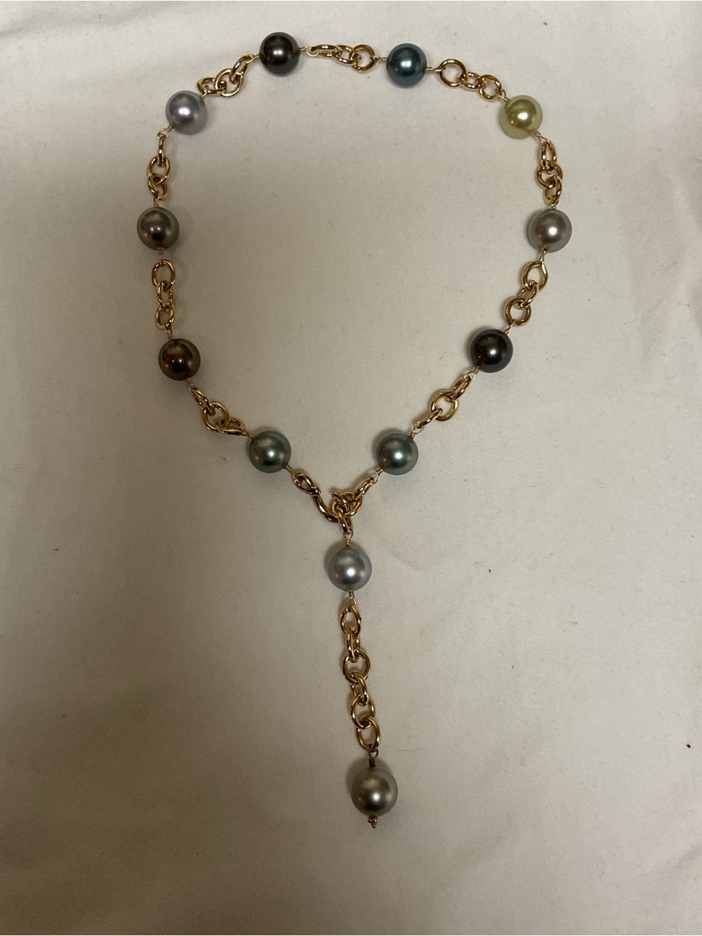 Multicolor Faux Pearl on a Gold-toned Chain.